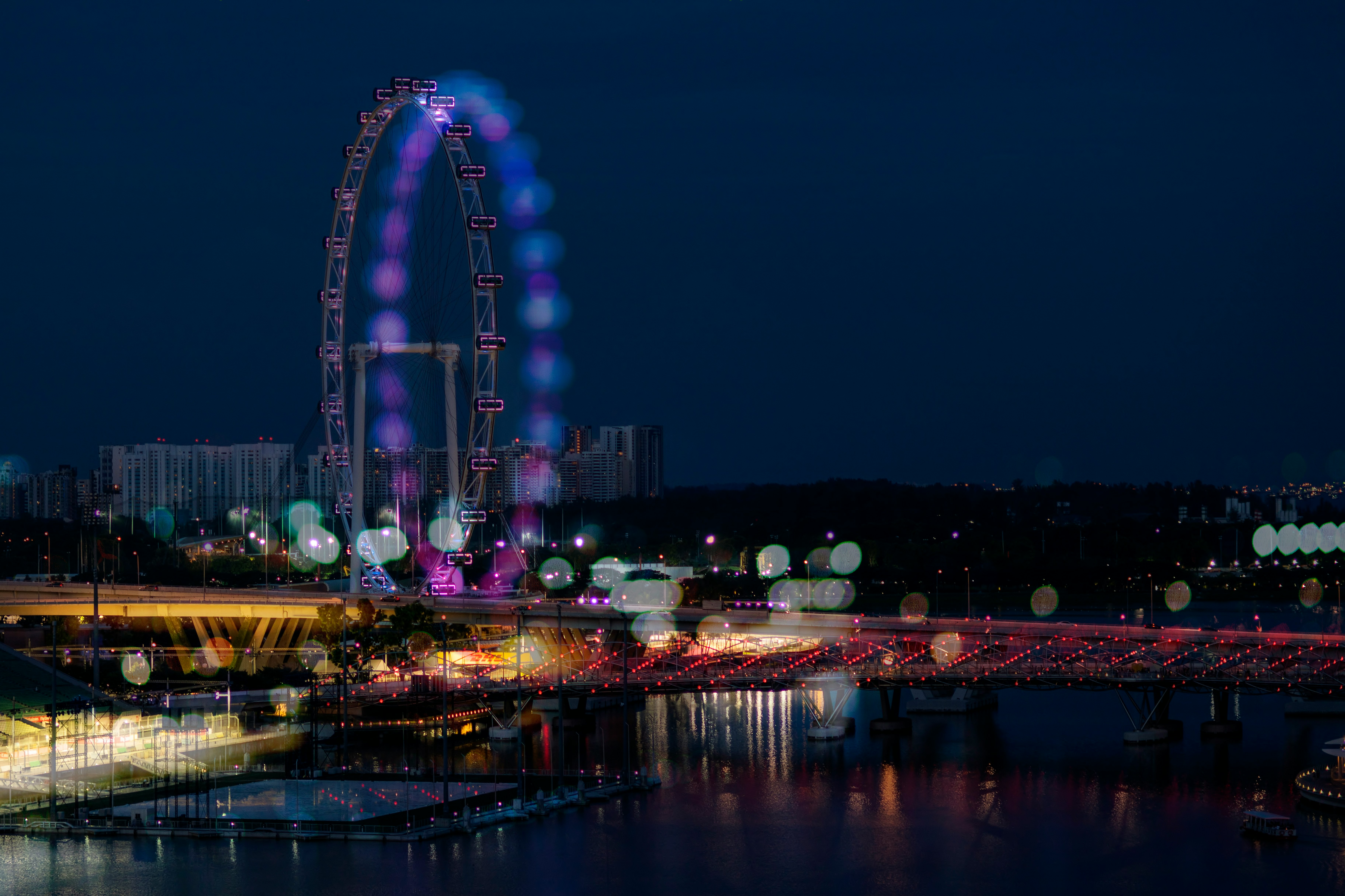 bokeh photography of ferris wheel